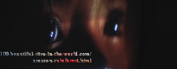 Amazonian Beautiful Images: Amazonian eyes looking through the darkness.