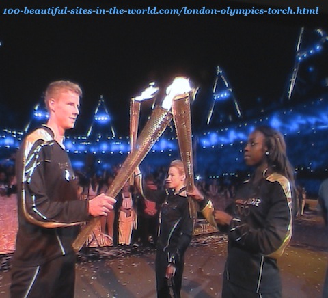 London Olympics torch. Athletes lighting other torches